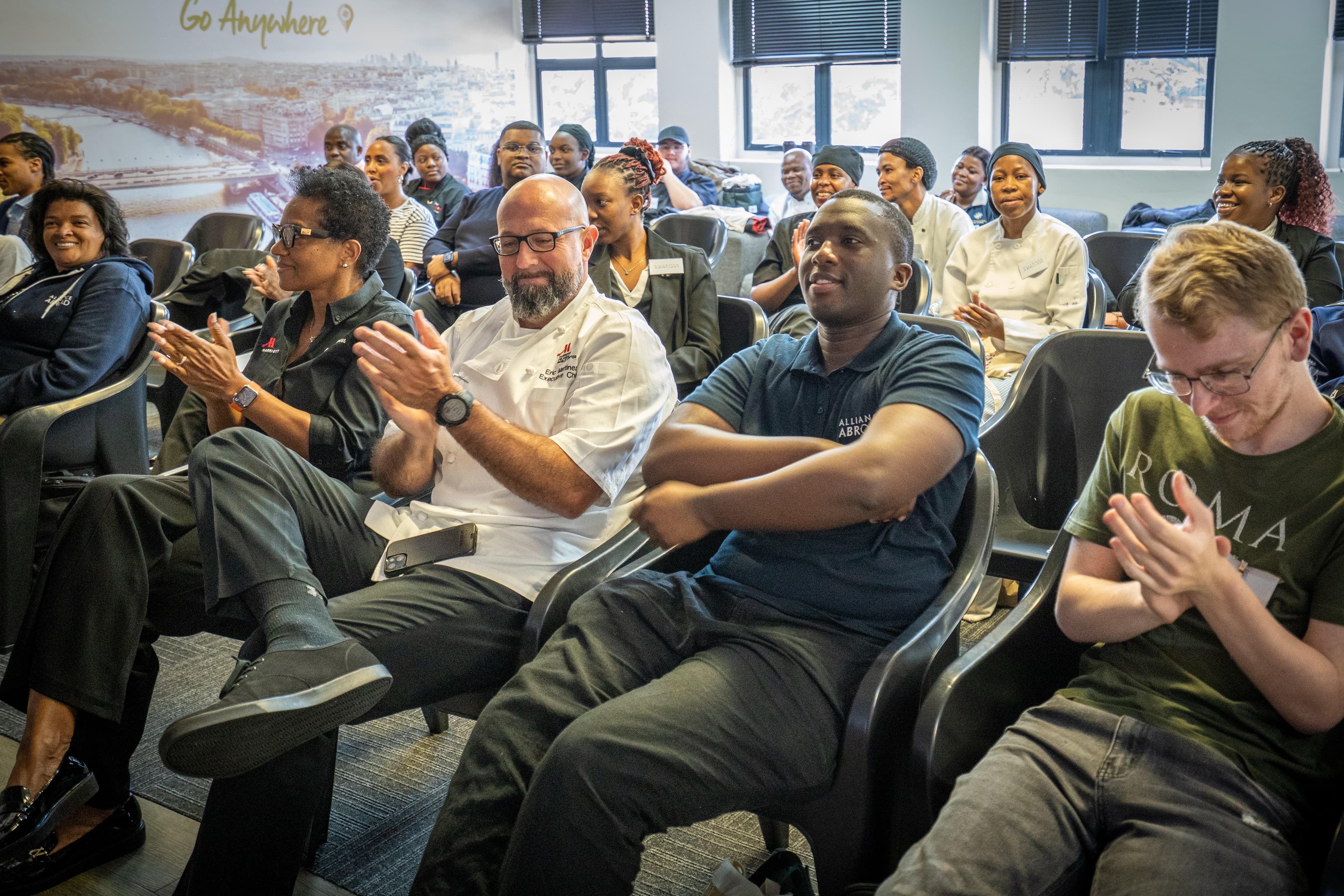 Job fair audience applauding a presentation, Cape Town