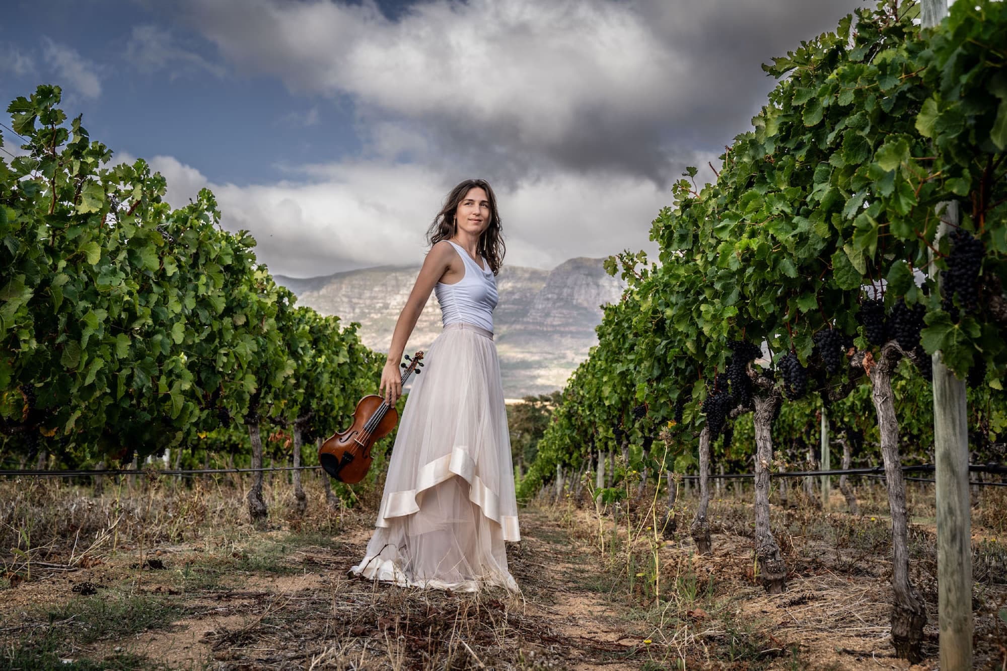 Lifestyle portrait, violinist in a vineyard, Cape Town