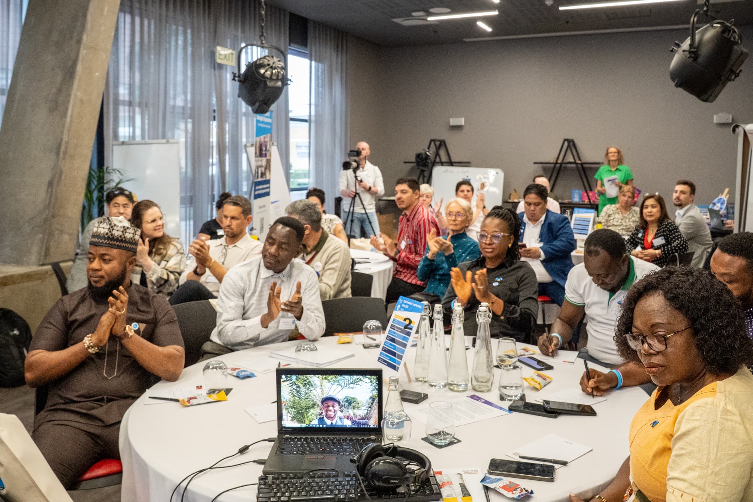 CoMO Members Conference delegates applauding, Cape Town