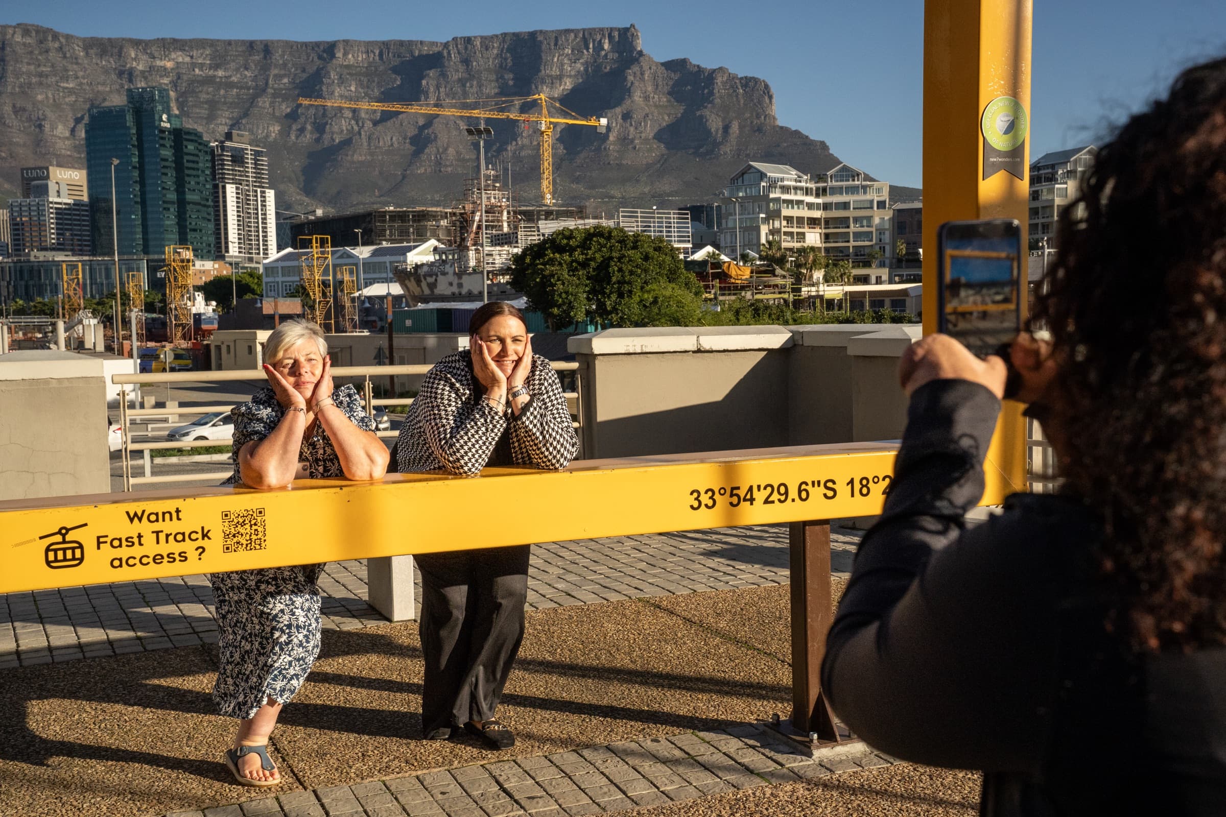 Event photographer capturing delegates with Table Mountain backdrop, Cape Town