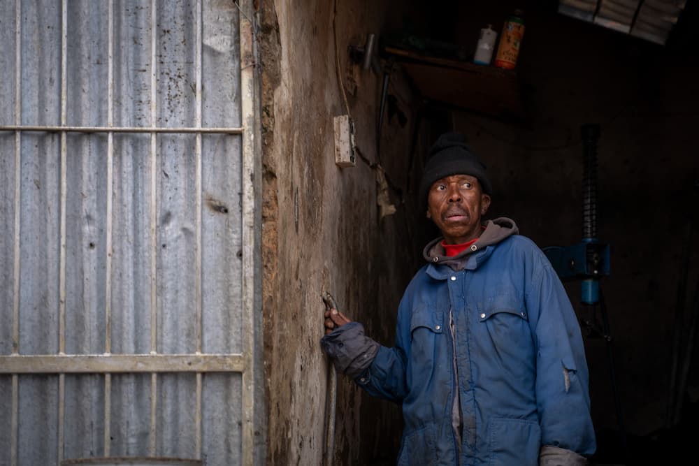 Street portrait of a man in a doorway, Cape Town