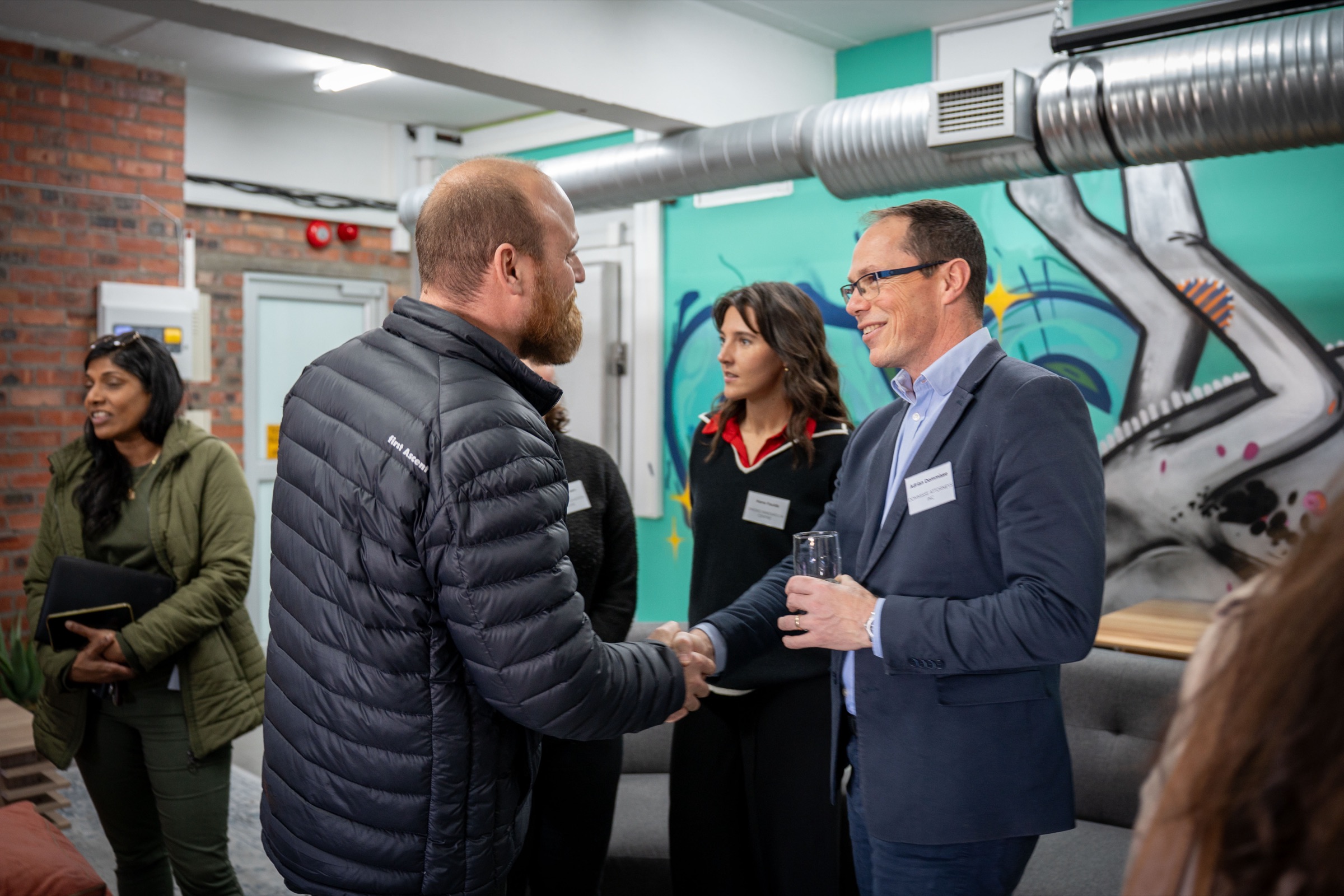 Corporate networking event handshake, Cape Town