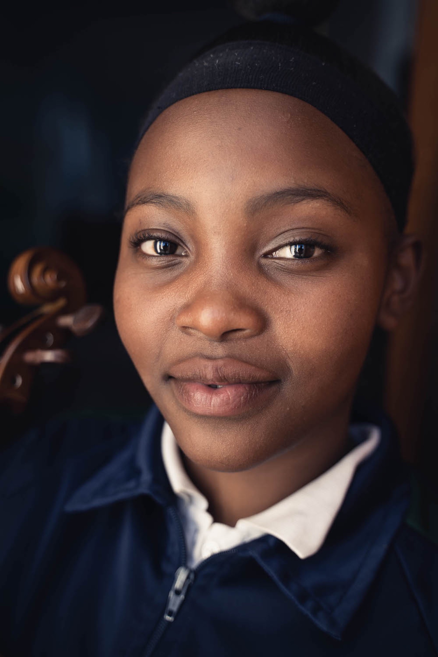 Creative portrait, young violinist close-up