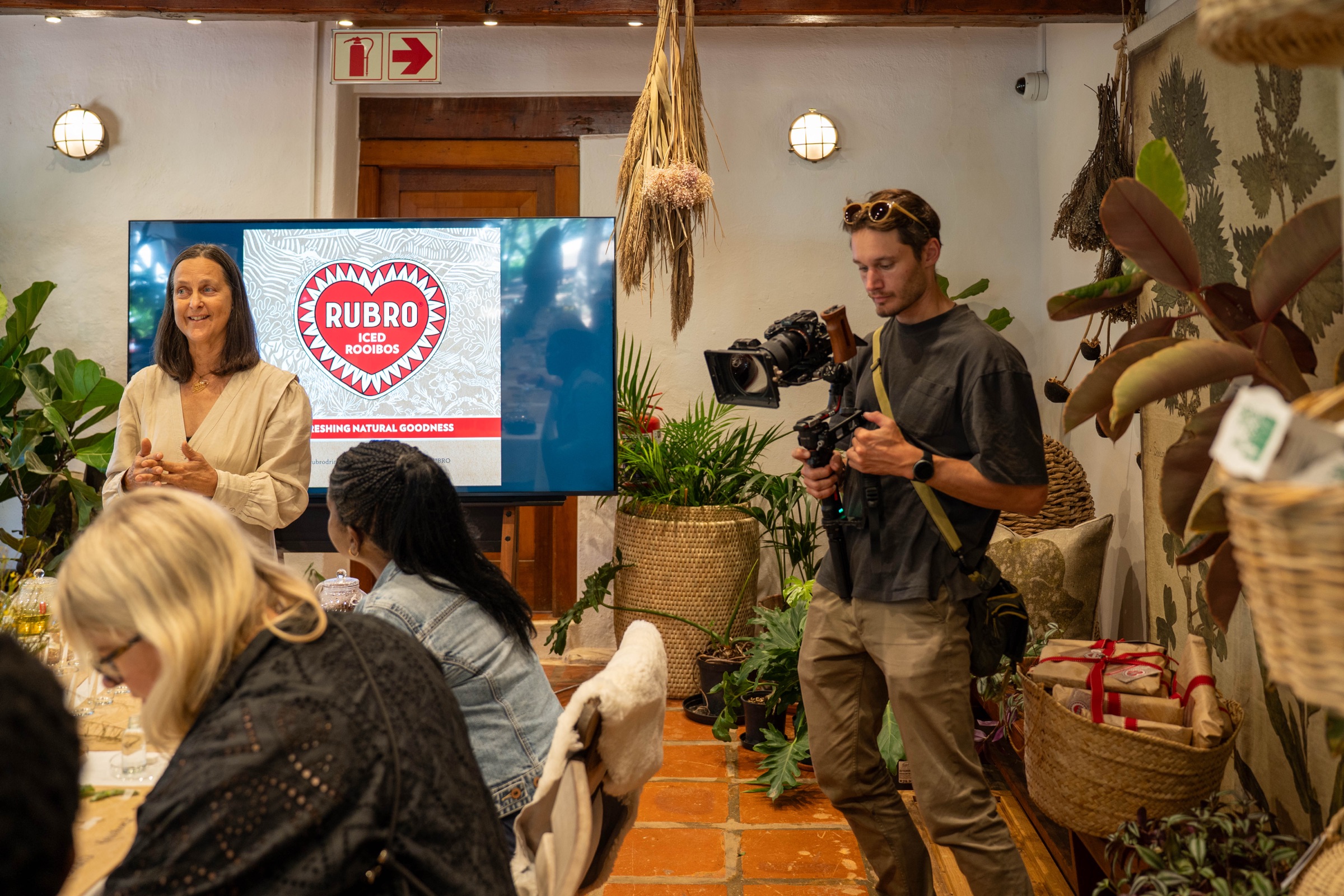 Behind the scenes, videographer filming a client presentation, Cape Town